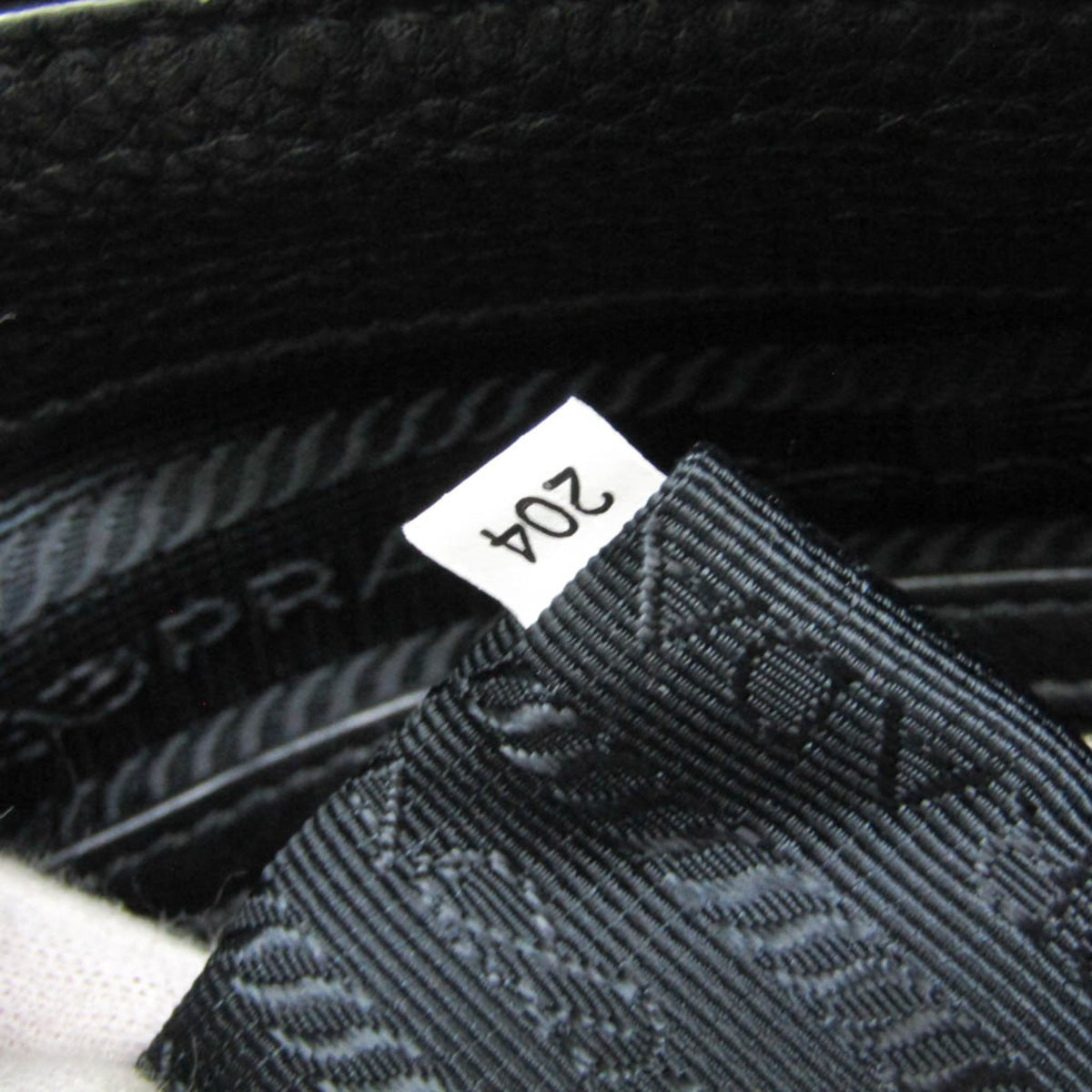 Prada Vitello Phenix · Leather