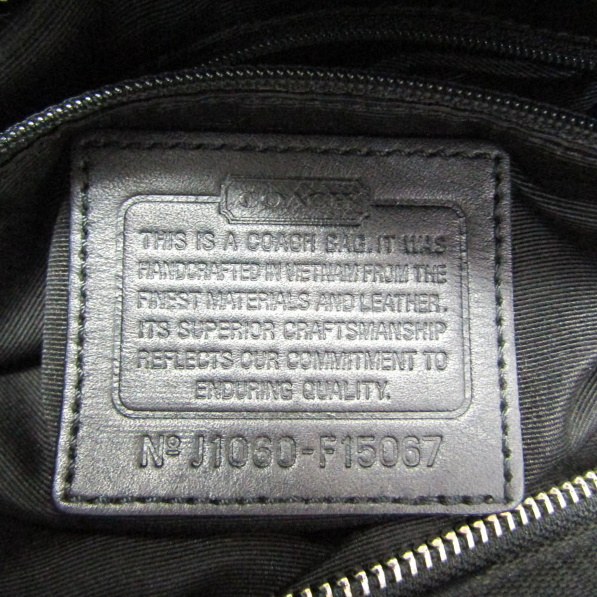 Coach Signature · Canvas & Leather