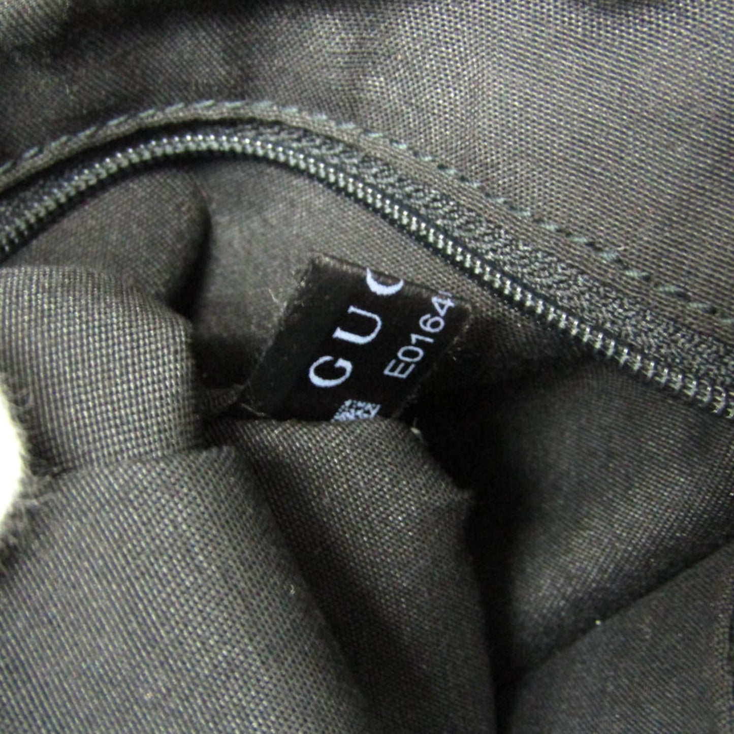 Gucci GG Canvas · Interlocking G