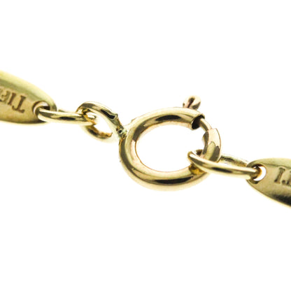 Tiffany Sebiana · 18K Yellow Gold