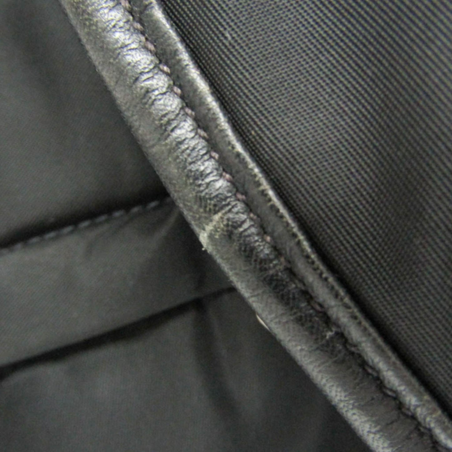 Prada Tessuto · Nylon & Leather