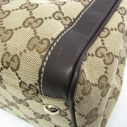 Gucci GG Canvas · Leather Handbag