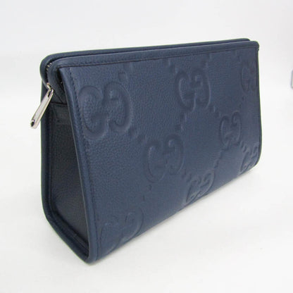 Gucci Jumbo GG · Leather Clutch