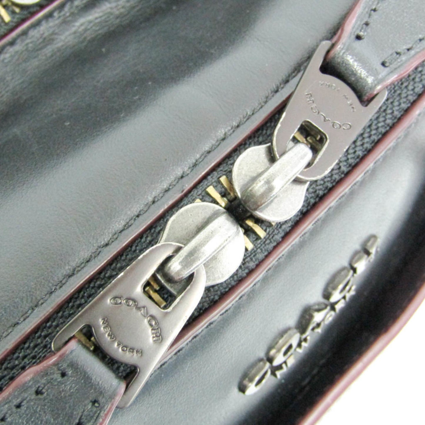 Coach Signature · Briefcase
