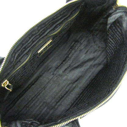 Prada Tessuto · Nylon & Leather
