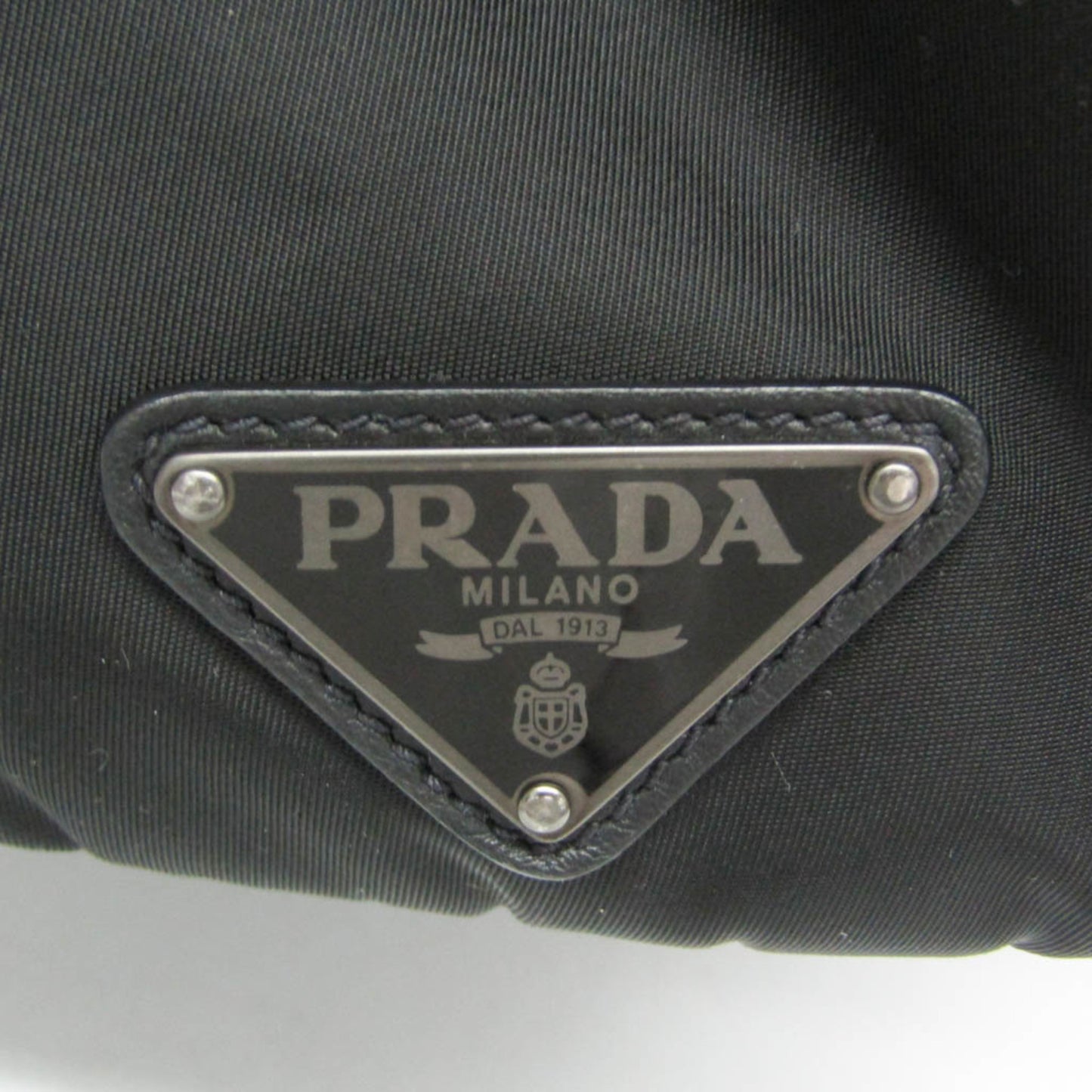 Prada Tessuto · Nylon & Leather
