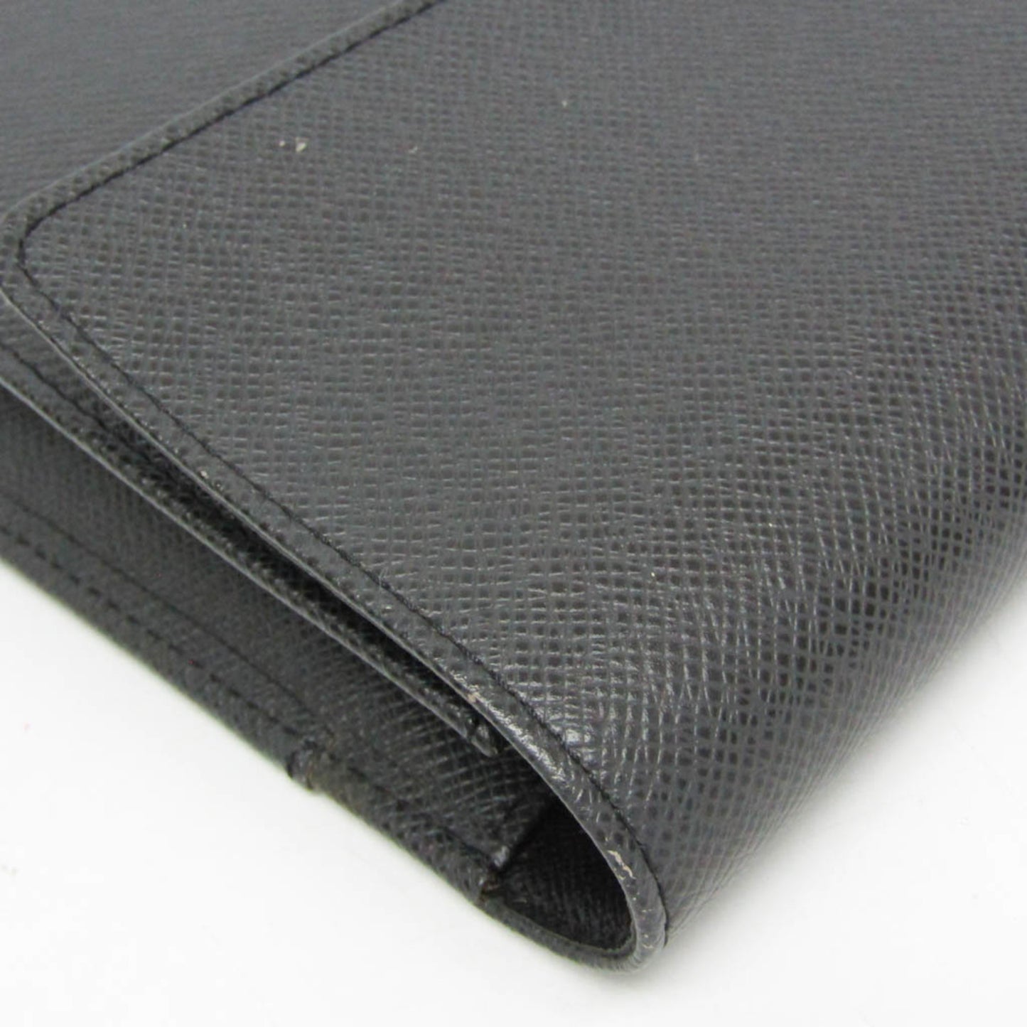 Louis Vuitton Taiga Selenga · Clutch