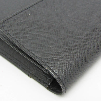 Louis Vuitton Taiga Selenga · Clutch