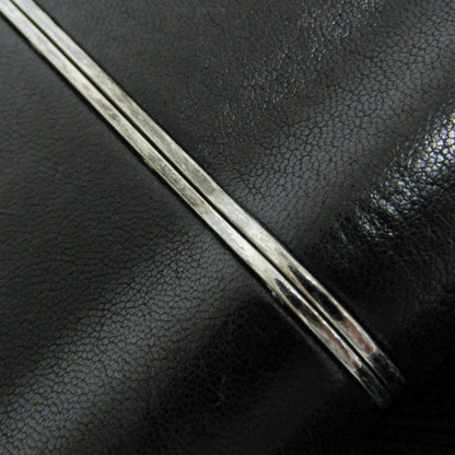 Yves Saint Laurent Opium · Leather