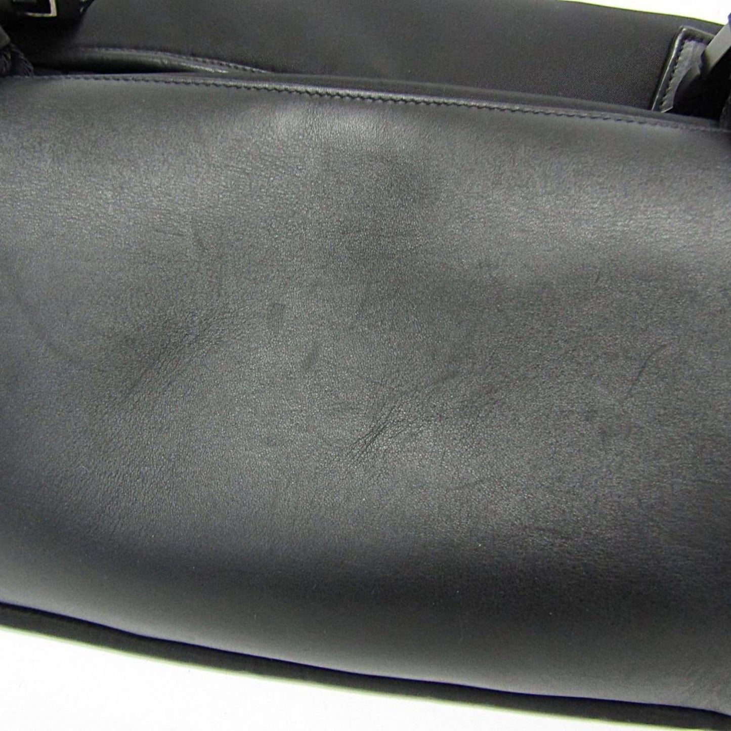 Prada Tessuto · Nylon & Leather
