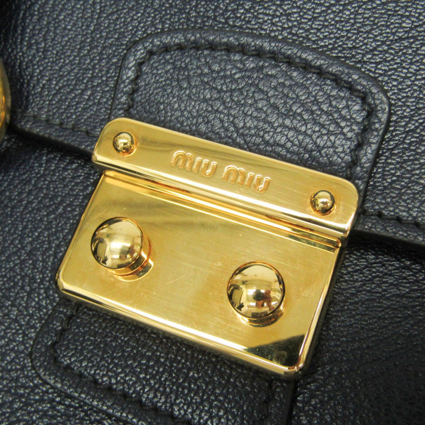 Miu Miu Madras · Leather
