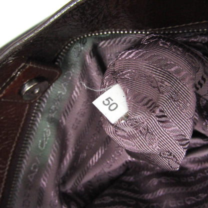 Prada Patent Leather · Metal Hardware