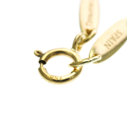 Tiffany Sebiana · 18K Yellow Gold