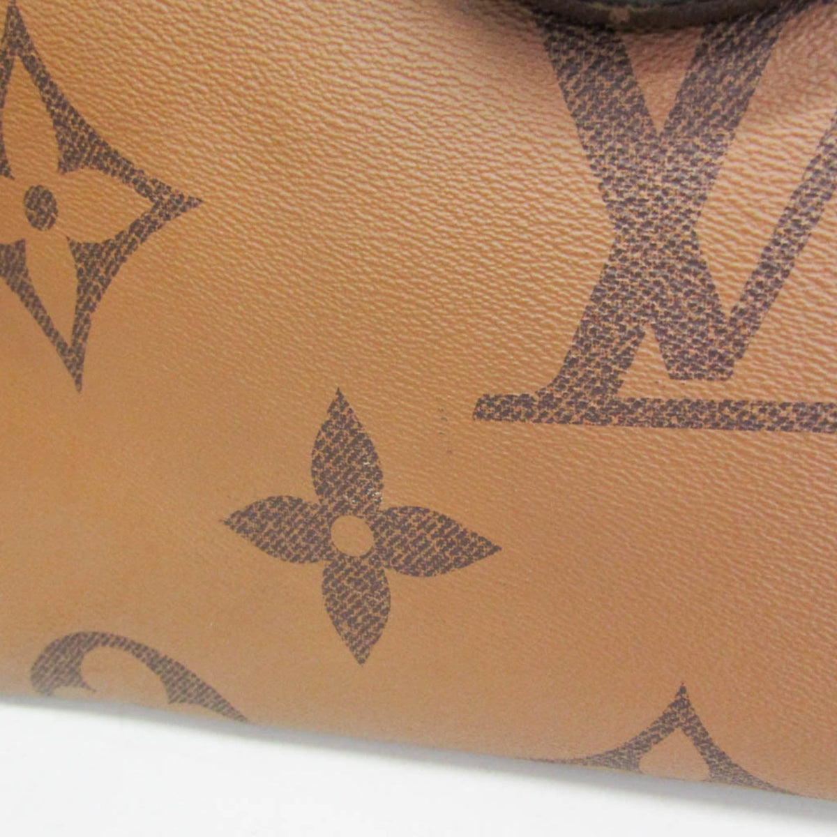 Louis Vuitton On The Go GM · Monogram Reverse
