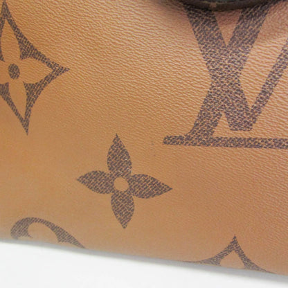 Louis Vuitton On The Go GM · Monogram Reverse