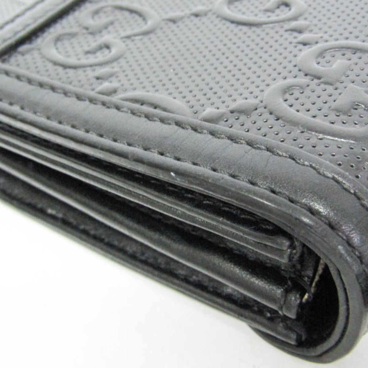 Gucci GG Embossed Crossbody · Leather