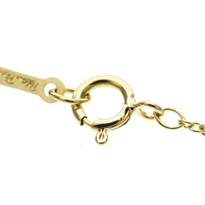 Tiffany Kiss · 18K Yellow Gold