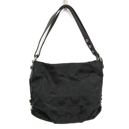 Coach Signature · Canvas & Leather