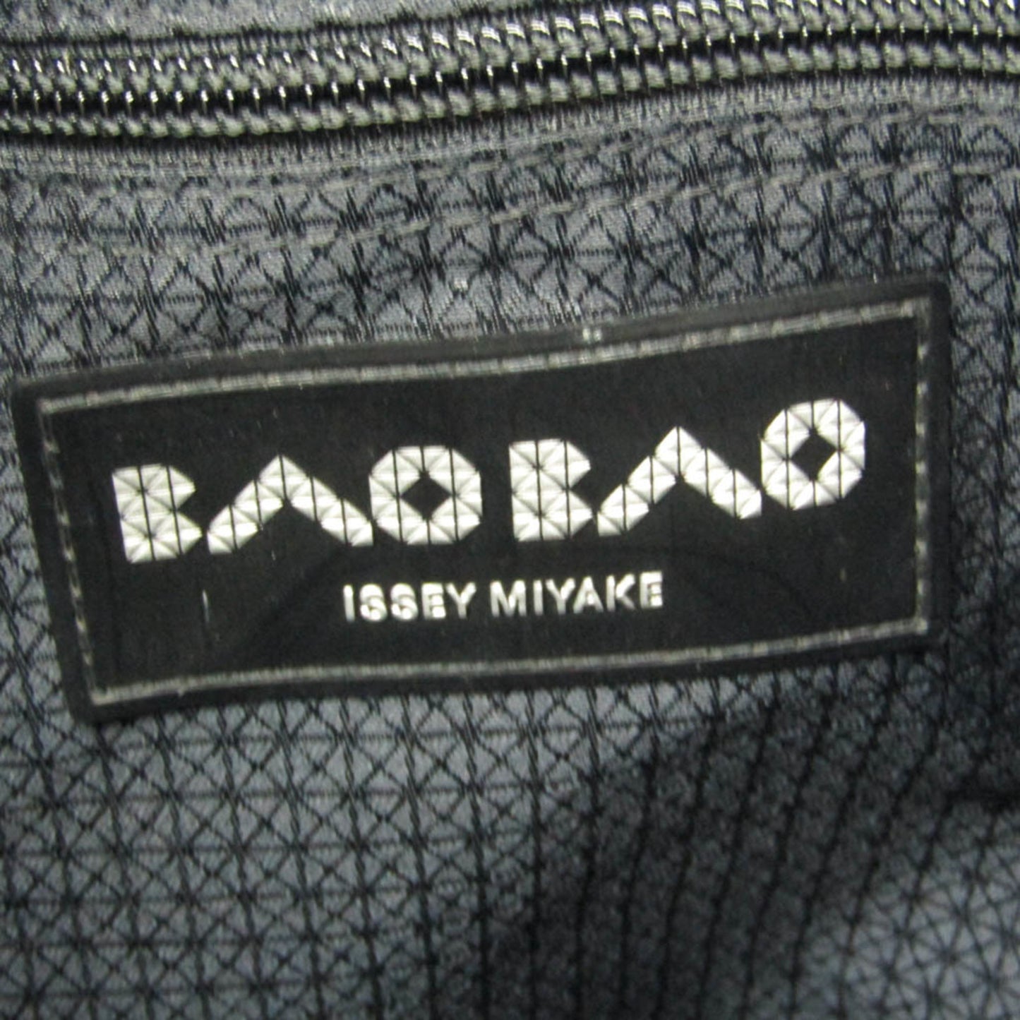 Issey Miyake Baobao · Lucent Gloss · Tote