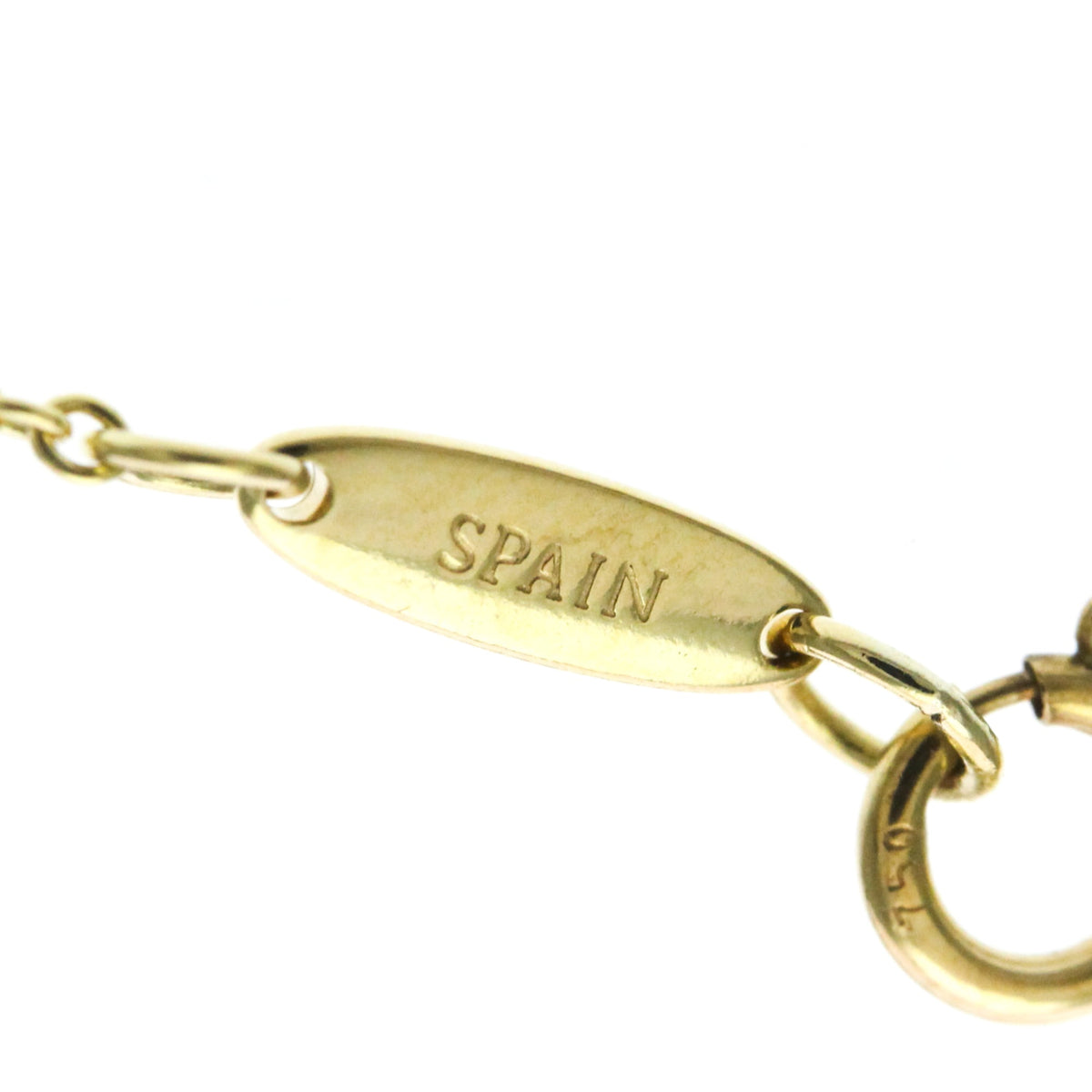 Tiffany Sebiana · 18K Yellow Gold