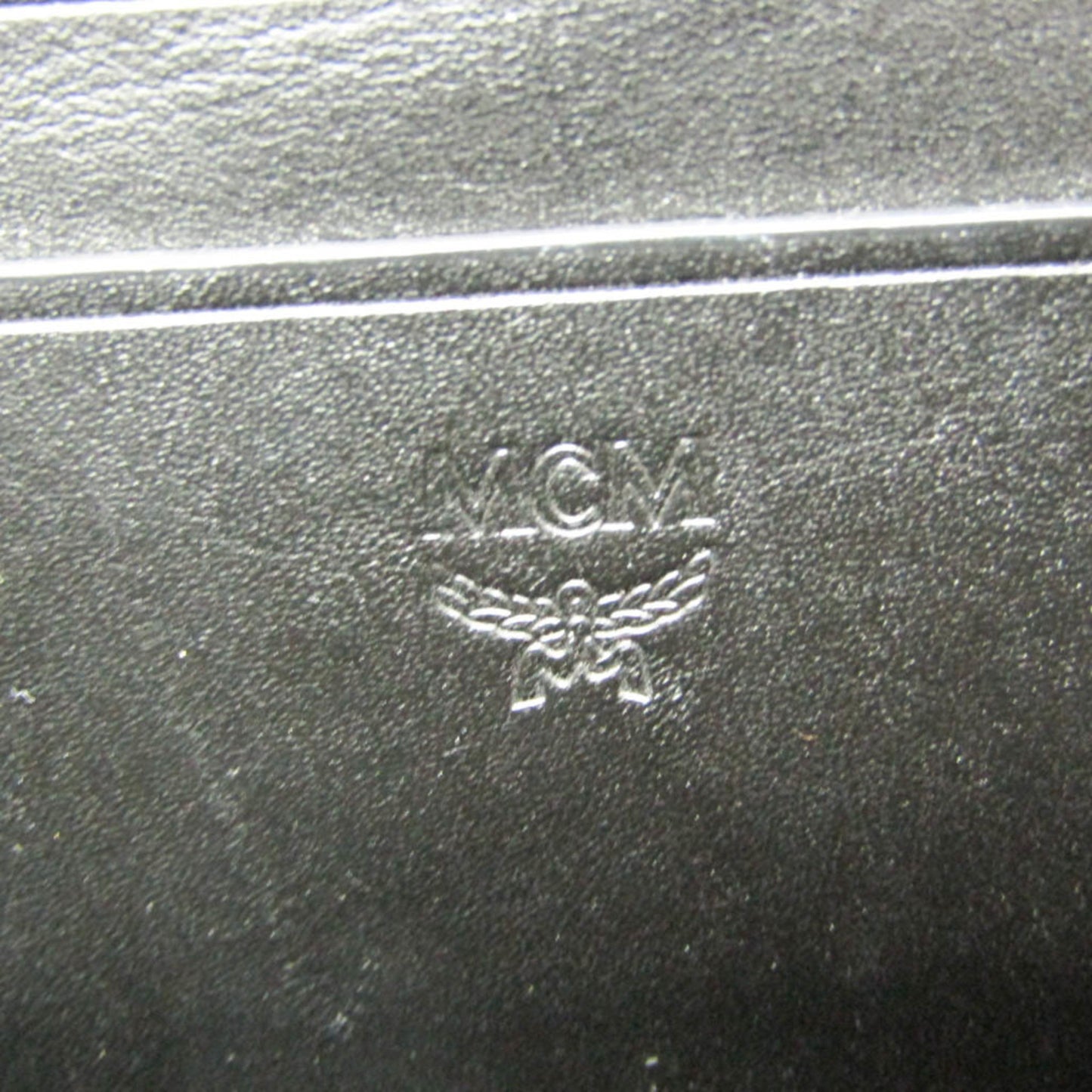 MCM Visetos Triple Body · Coated Canvas