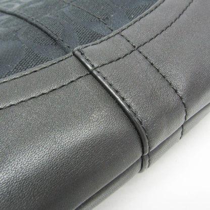 Coach Signature · Canvas & Leather