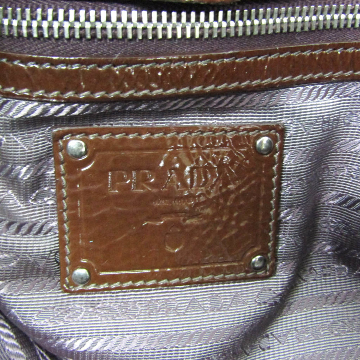 Prada Patent Leather · Metal Hardware