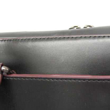 Coach Signature · Briefcase
