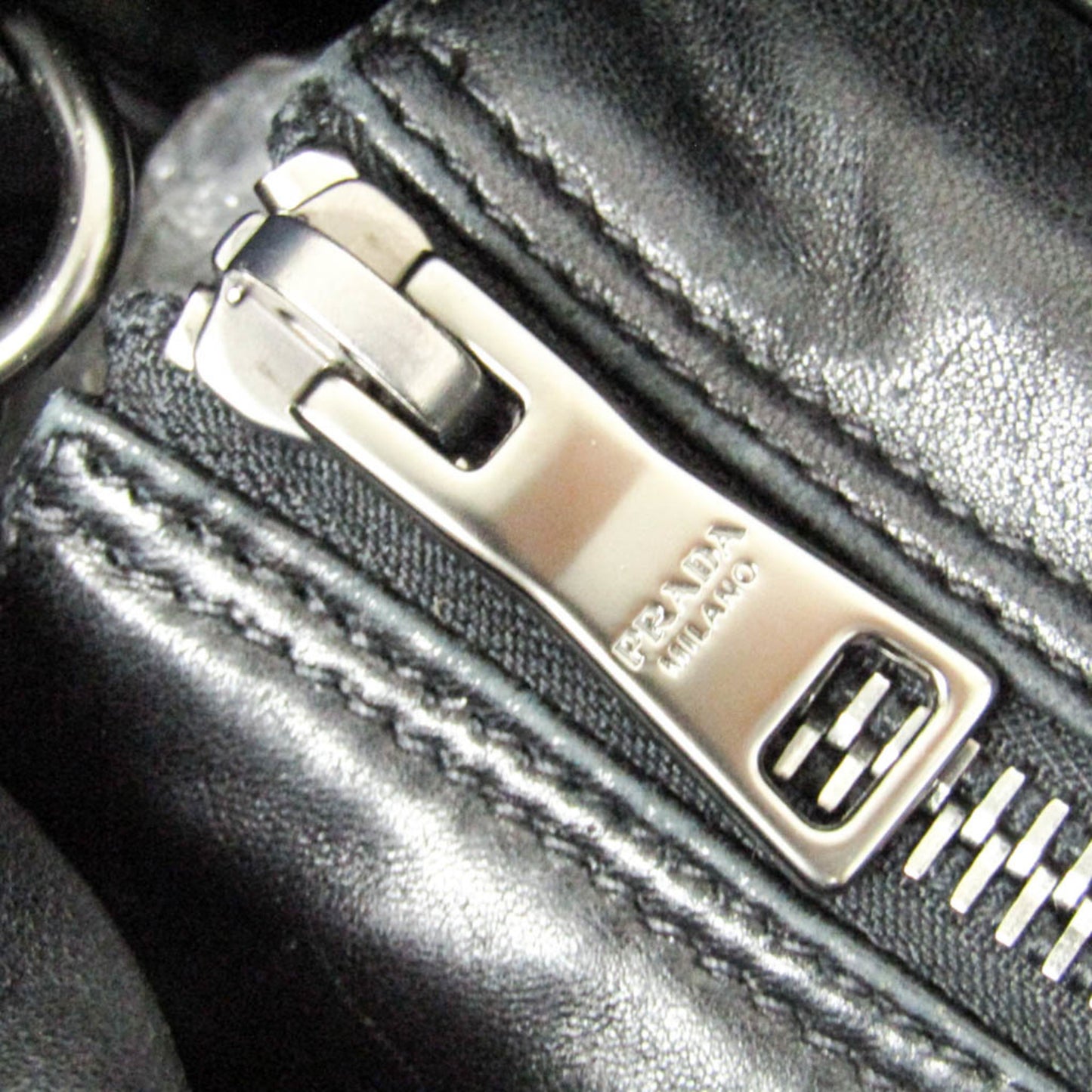 Prada Tessuto Nappa · Nylon & Leather