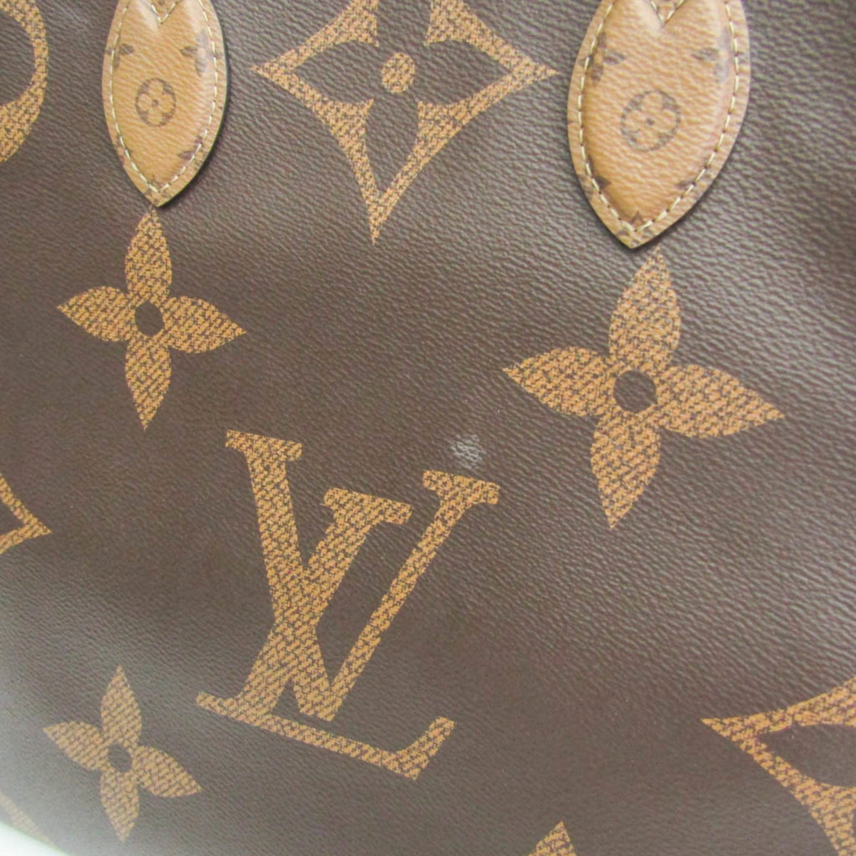 Louis Vuitton On The Go GM · Monogram Reverse