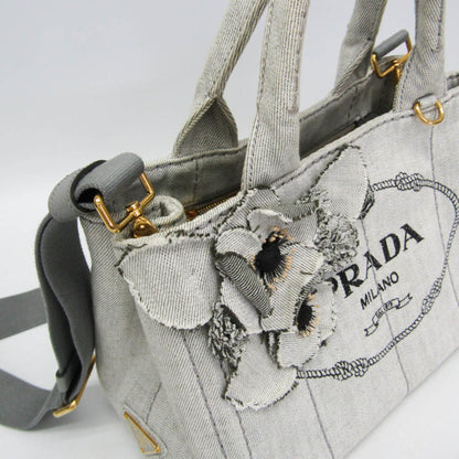 Prada Canapa · Denim · Flower Corsage