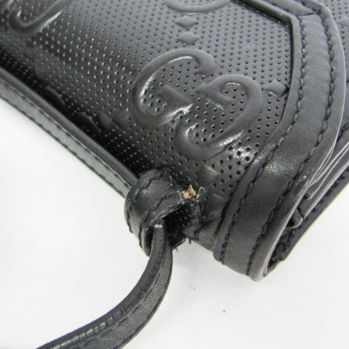 Gucci GG Embossed Crossbody · Leather