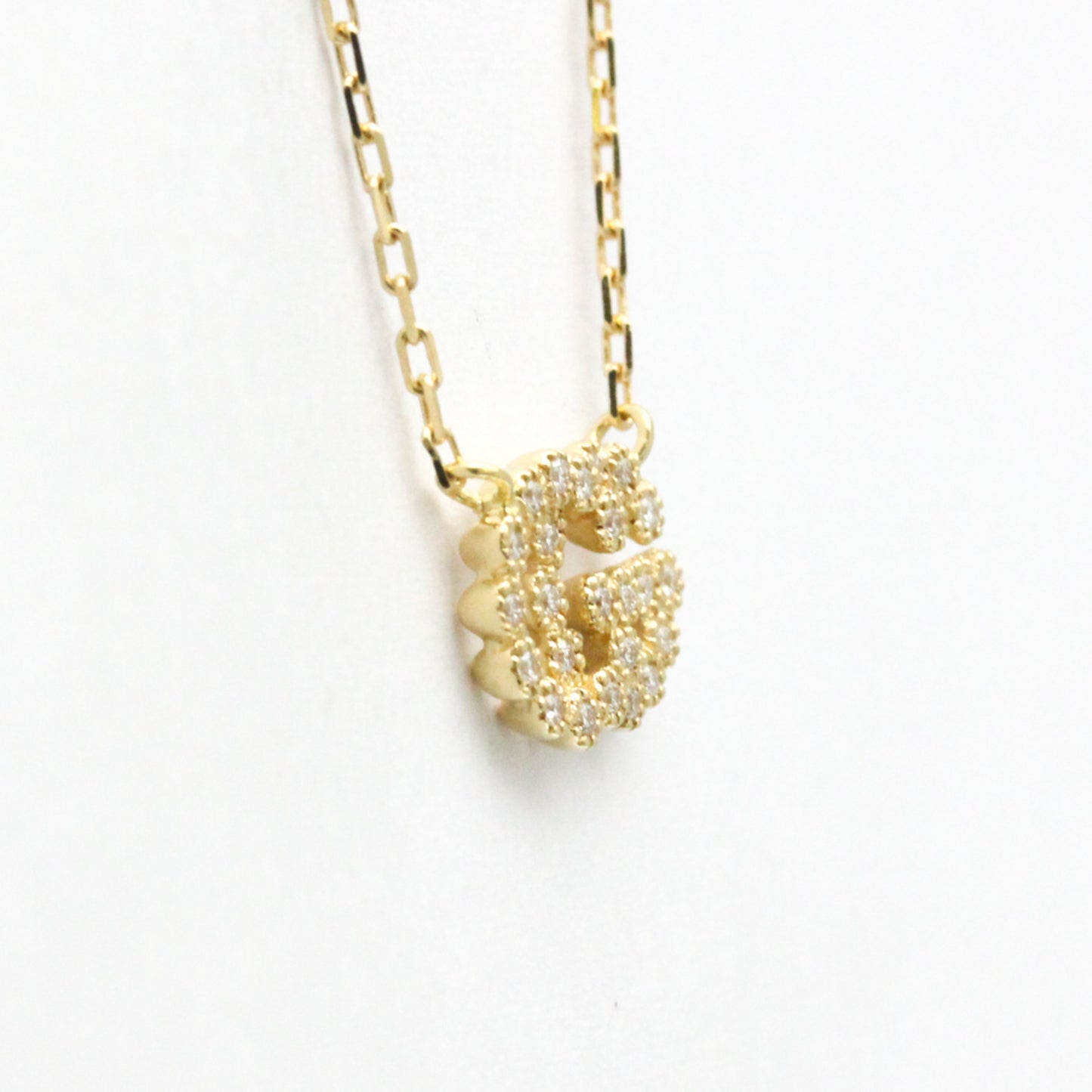 Gucci GG Logo · Diamond · 18K Yellow Gold