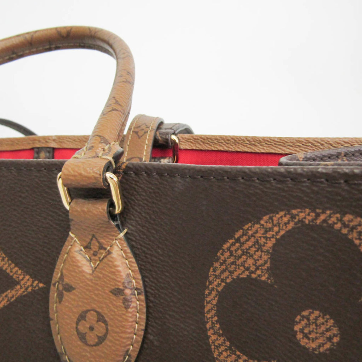 Louis Vuitton On The Go GM · Monogram Reverse