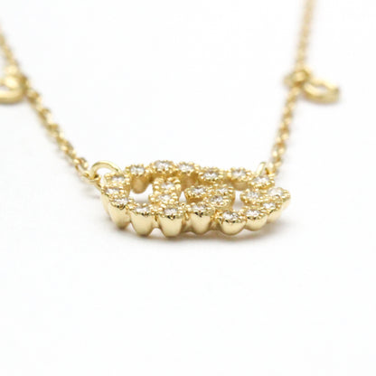 Gucci GG Logo · Diamond · 18K Yellow Gold
