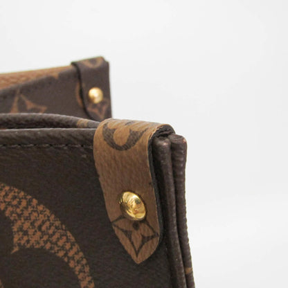 Louis Vuitton On The Go GM · Monogram Reverse