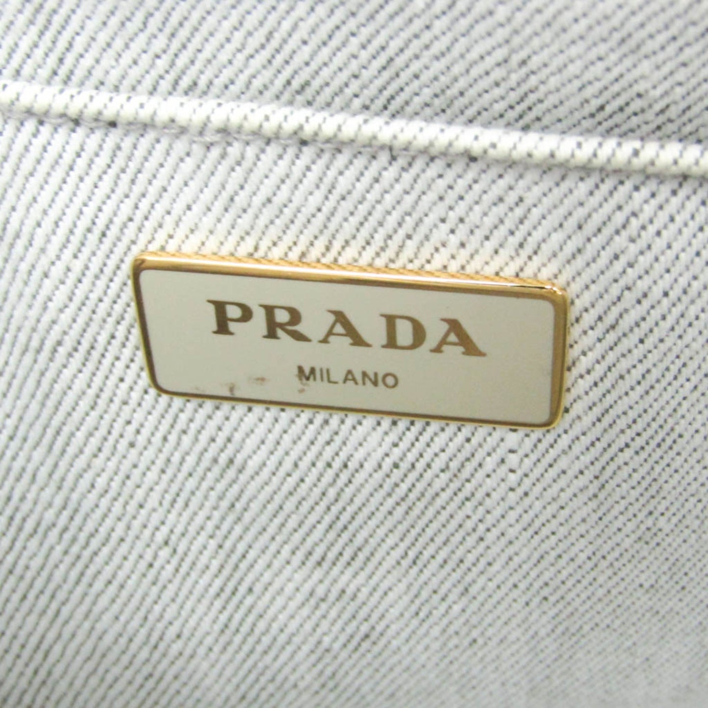 Prada Canapa · Denim · Flower Corsage