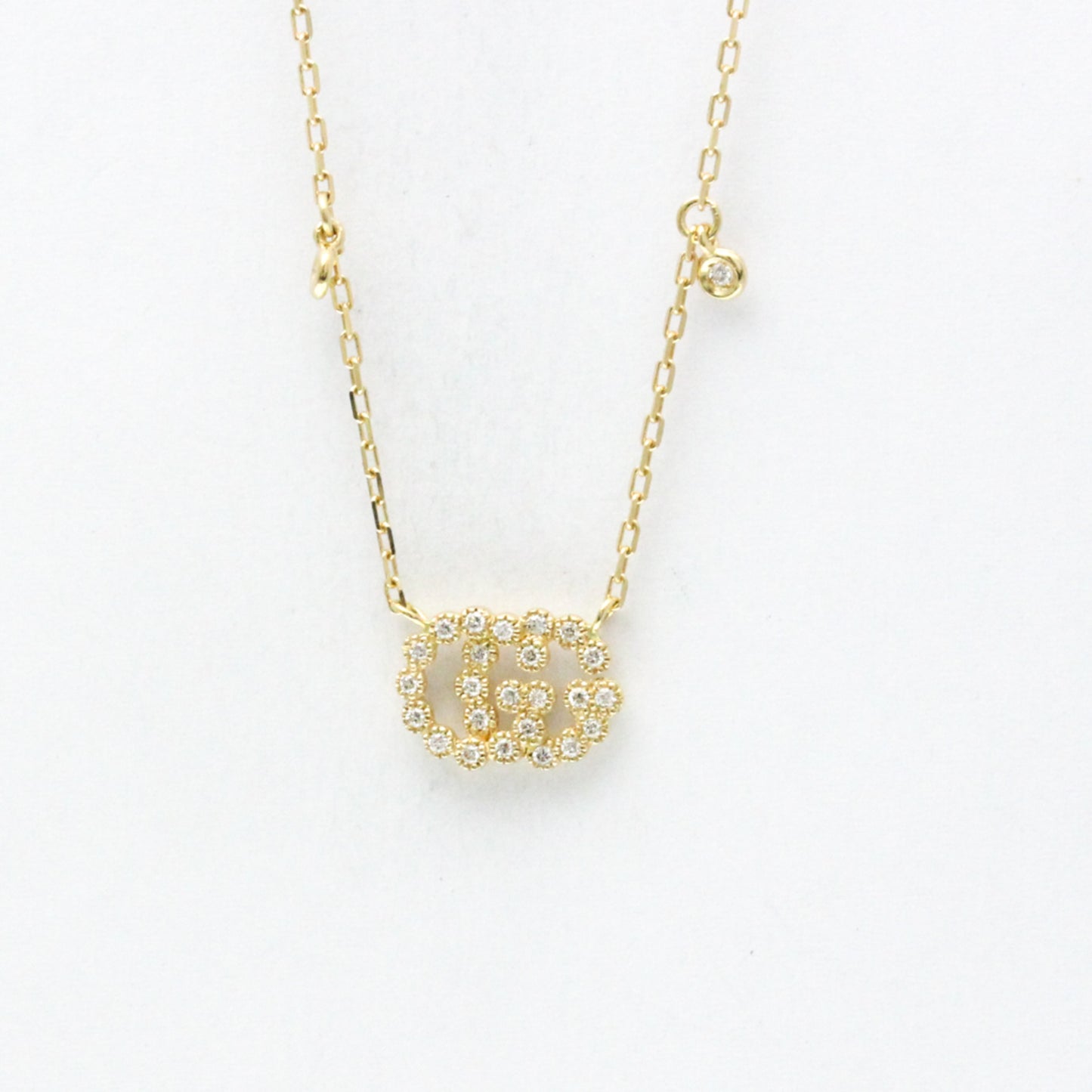 Gucci GG Logo · Diamond · 18K Yellow Gold