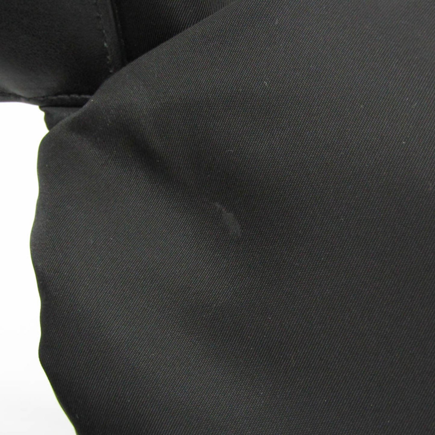 Prada Tessuto · Nylon & Leather