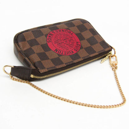 Louis Vuitton Damier Mini Pochette · Ebene