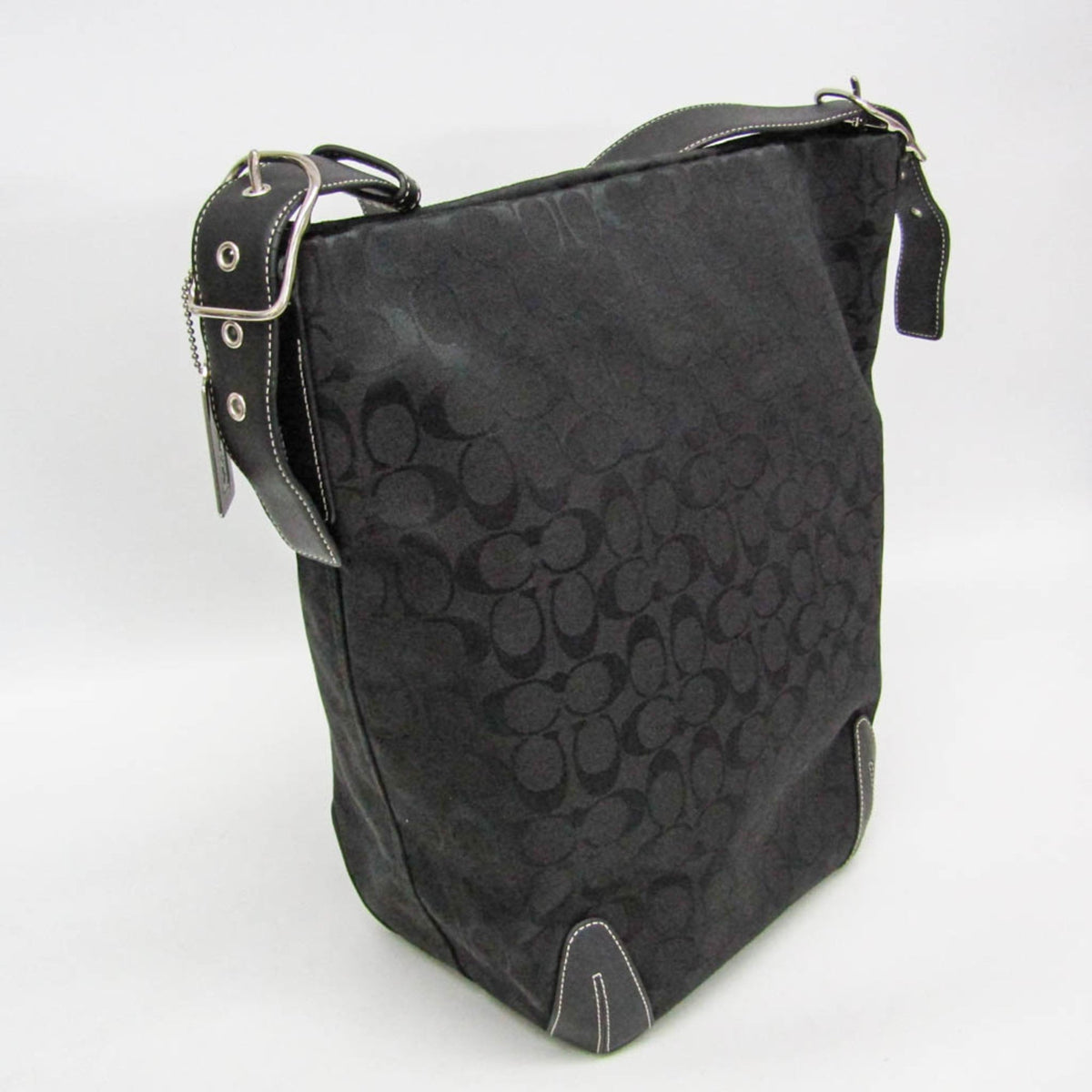 Coach Signature · Canvas & Leather