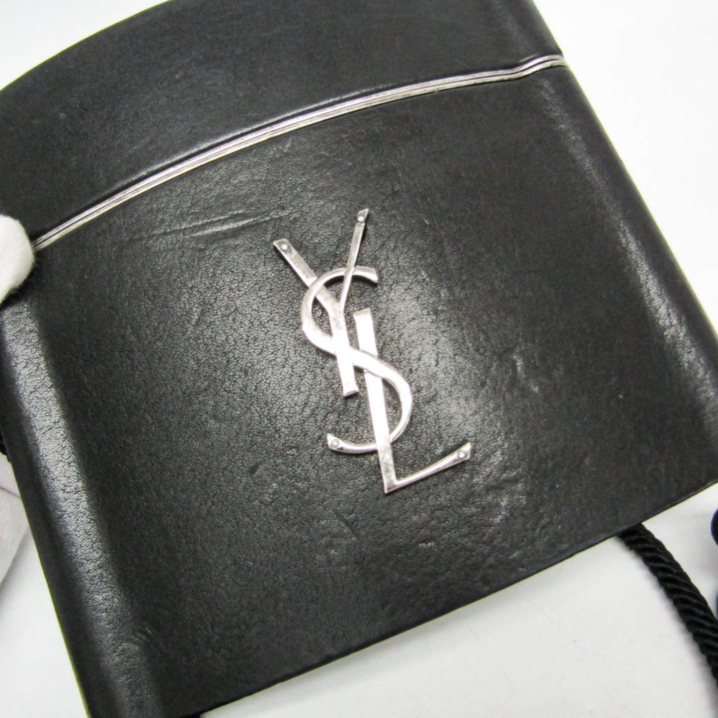 Yves Saint Laurent Opium · Leather
