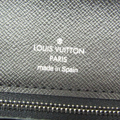 Louis Vuitton Taiga Selenga · Clutch