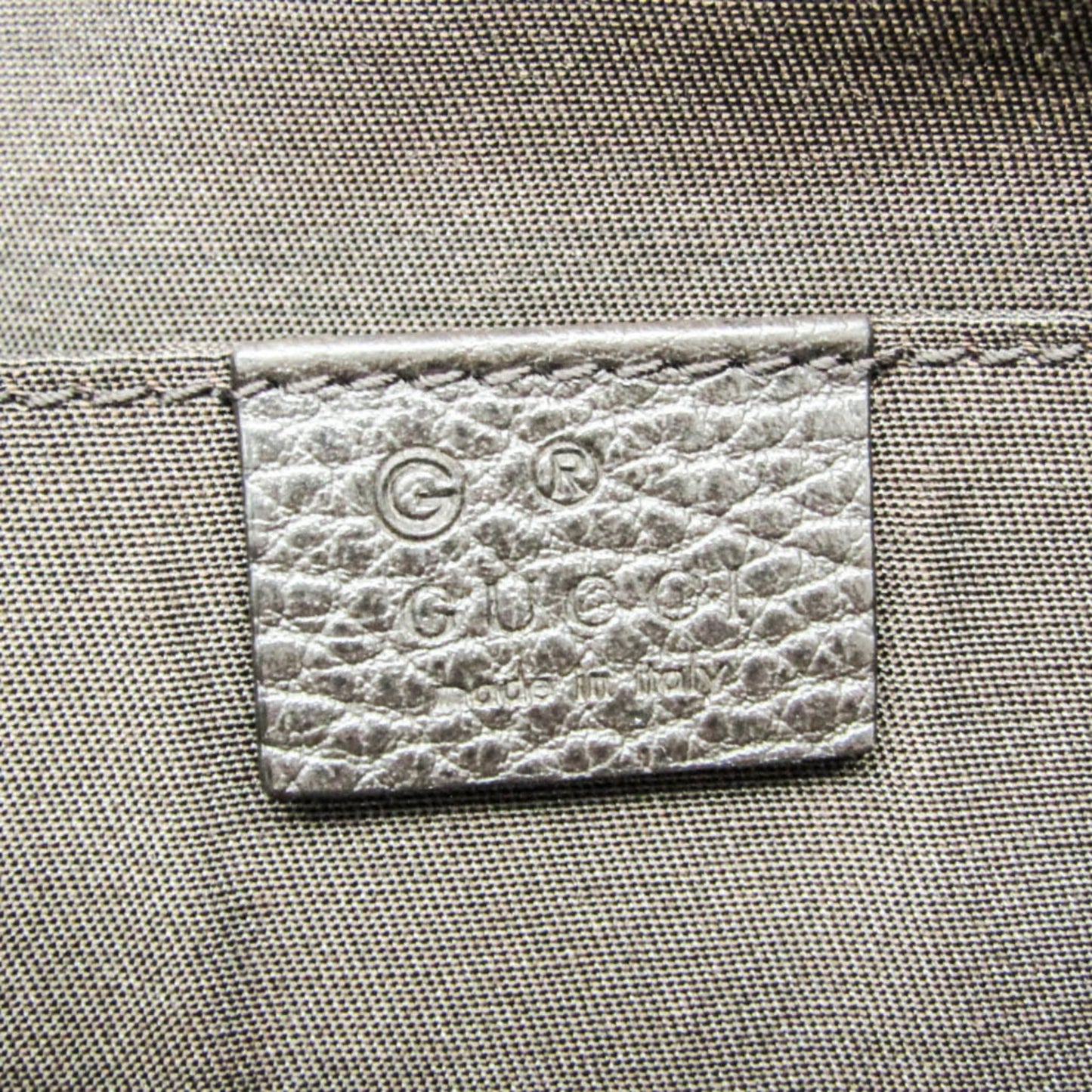 Gucci · Leather