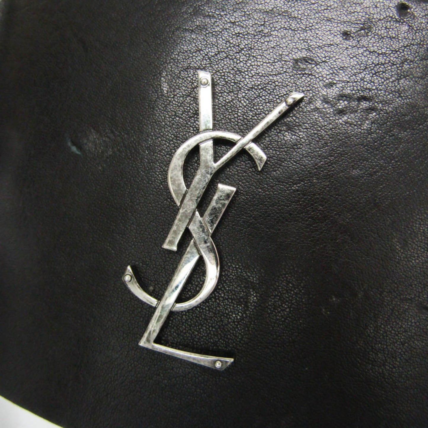 Yves Saint Laurent Opium · Leather