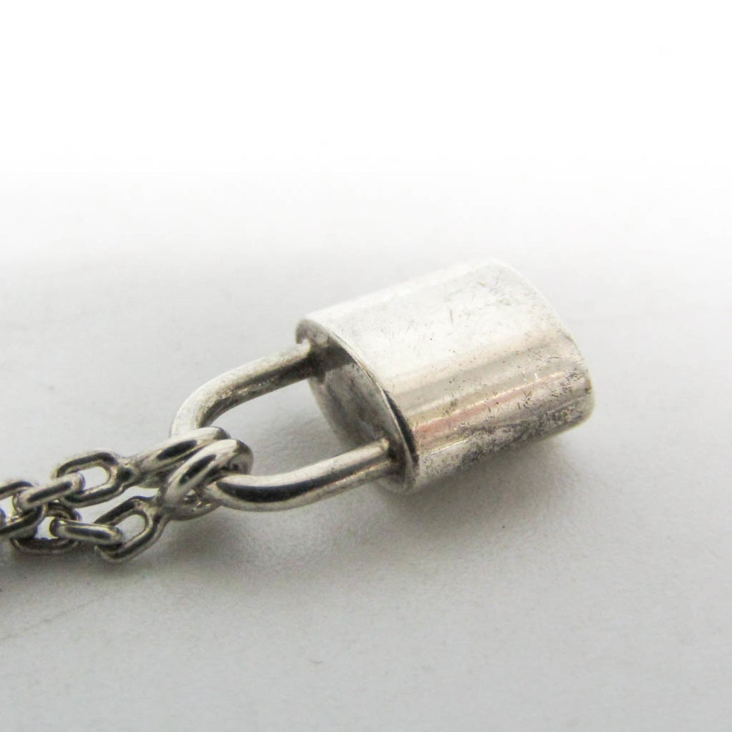 Louis Vuitton Lockit · Sterling Silver