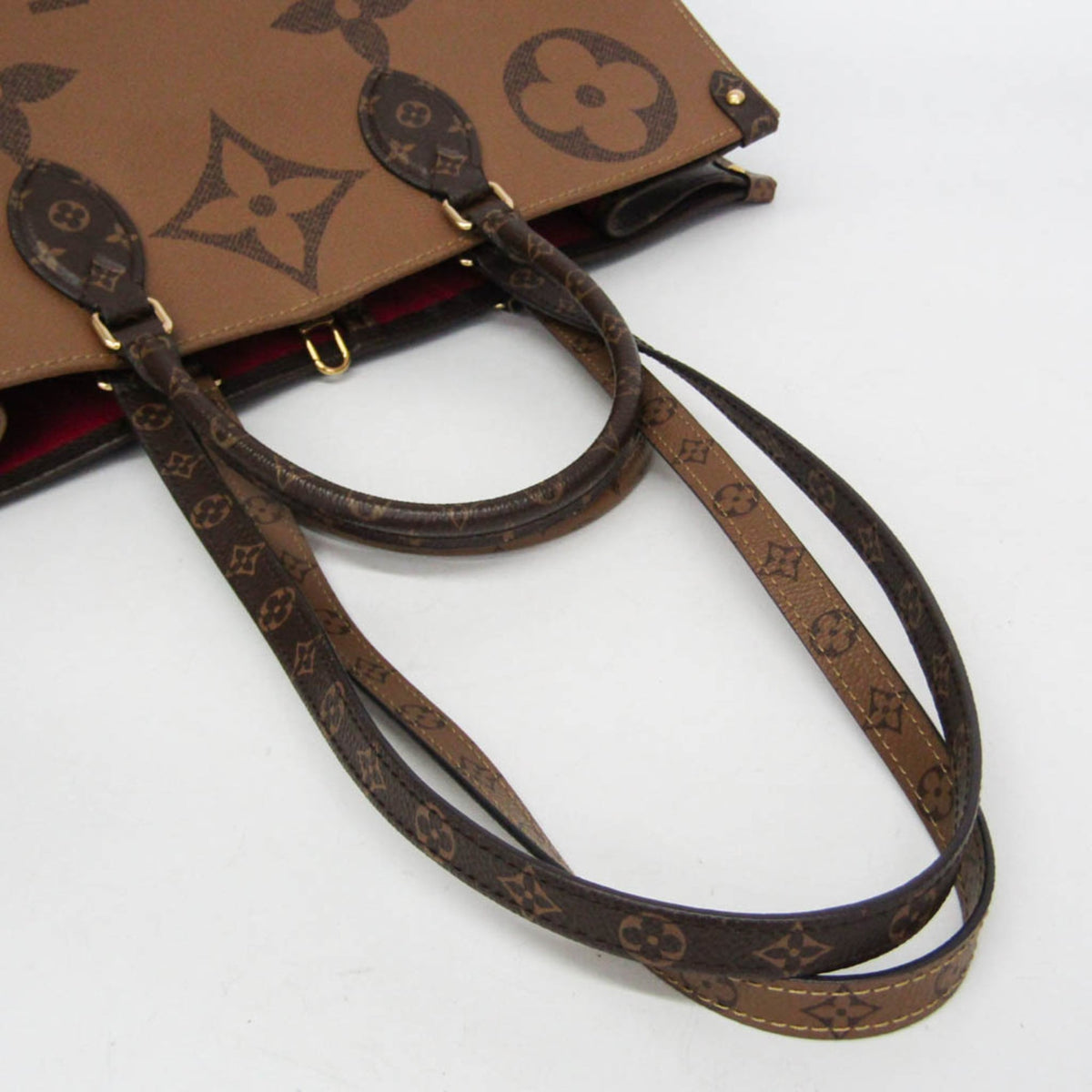 Louis Vuitton On The Go GM · Monogram Reverse