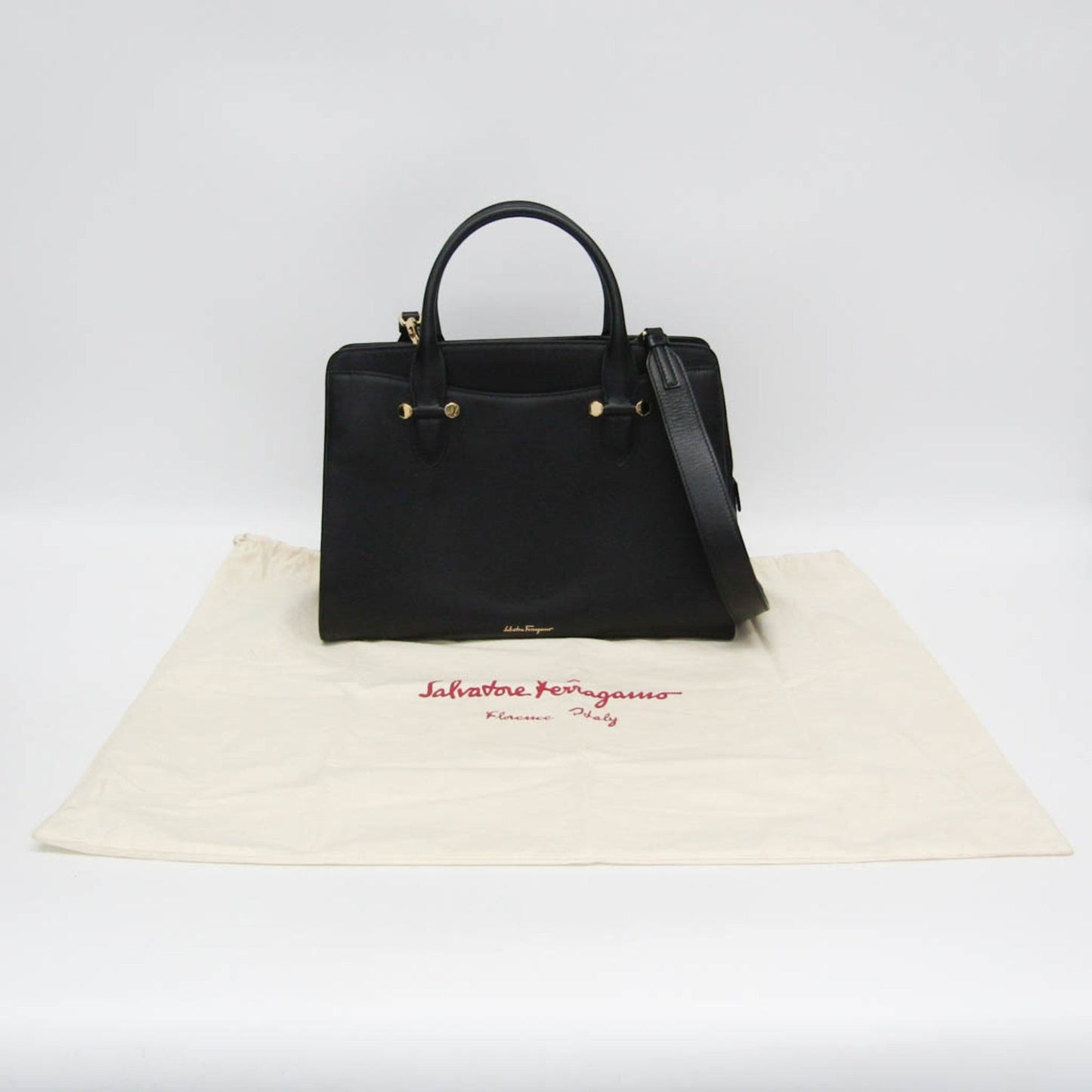 tokyopieces.com pre-owned black leather Salvatore Ferragamo Today tote bag with gold hardware and dust bag