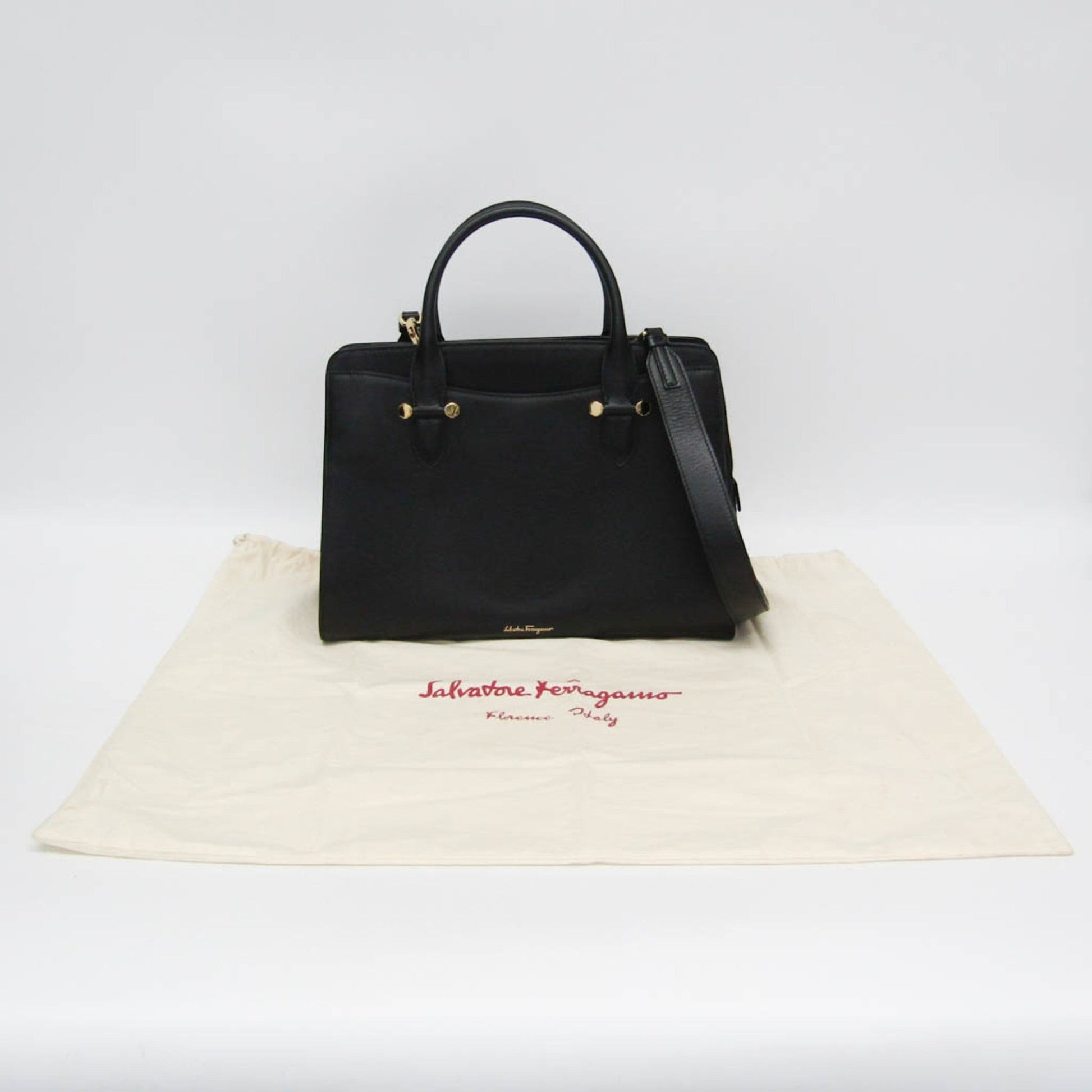tokyopieces.com pre-owned black leather Salvatore Ferragamo Today tote bag with gold hardware and dust bag