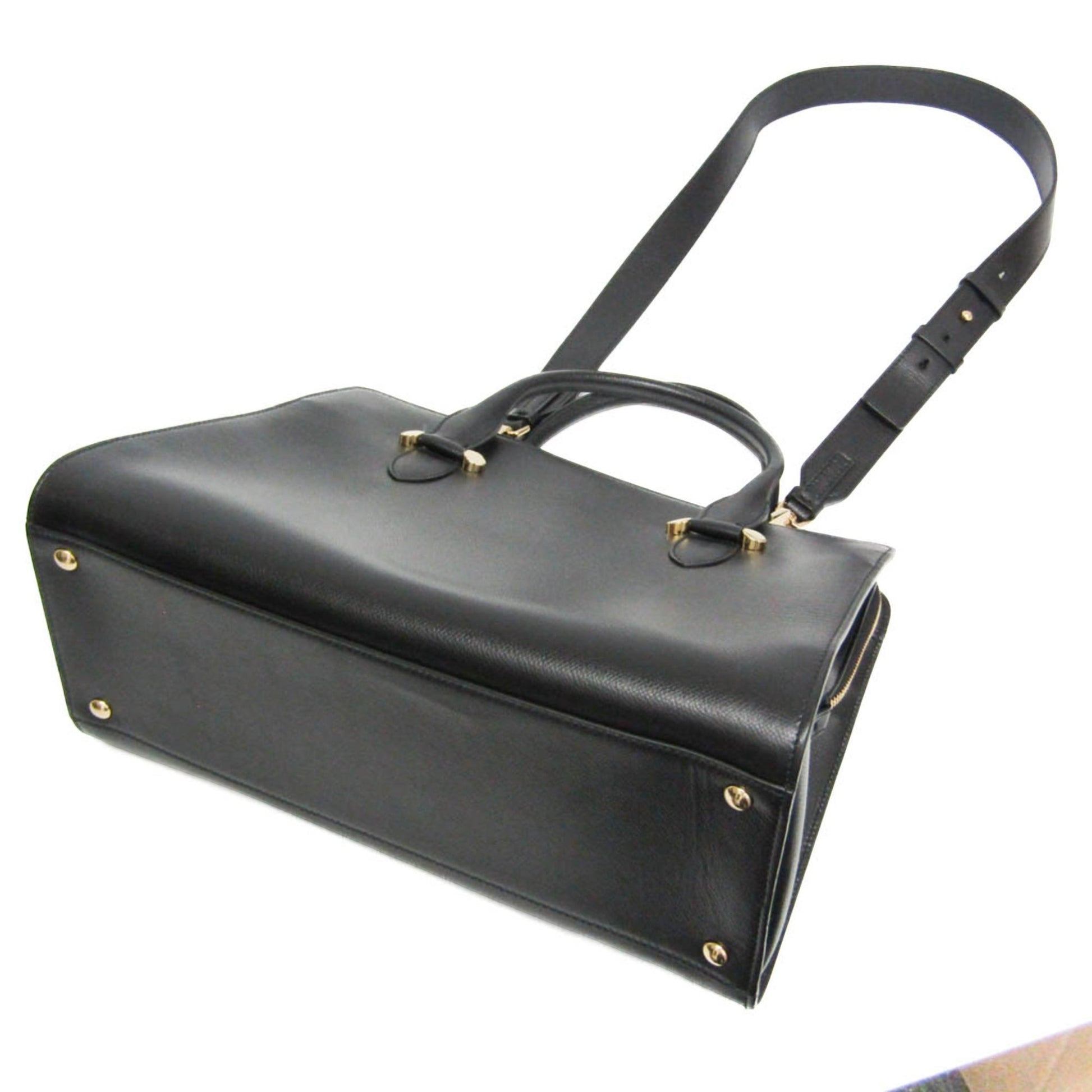 tokyopieces.com pre-owned Salvatore Ferragamo Today black leather tote bag with gold hardware and shoulder strap.
